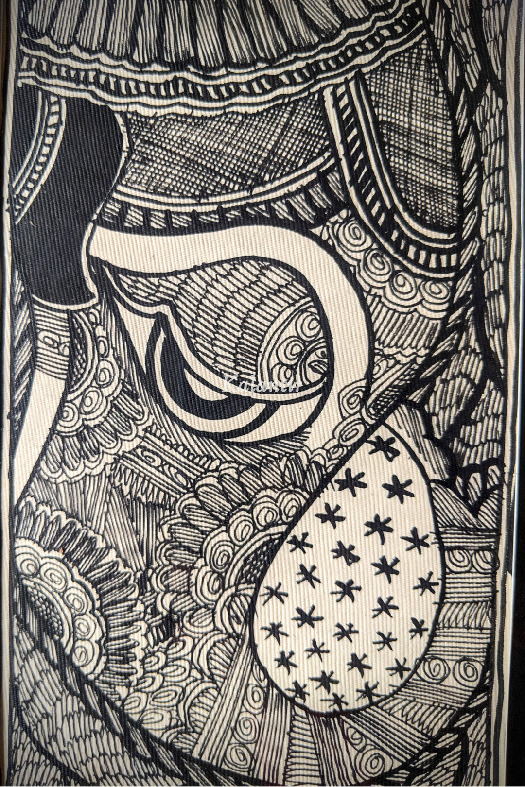 Closer view showing traditional Madhubani motifs on Lord Ganesha's forehead and trunk.