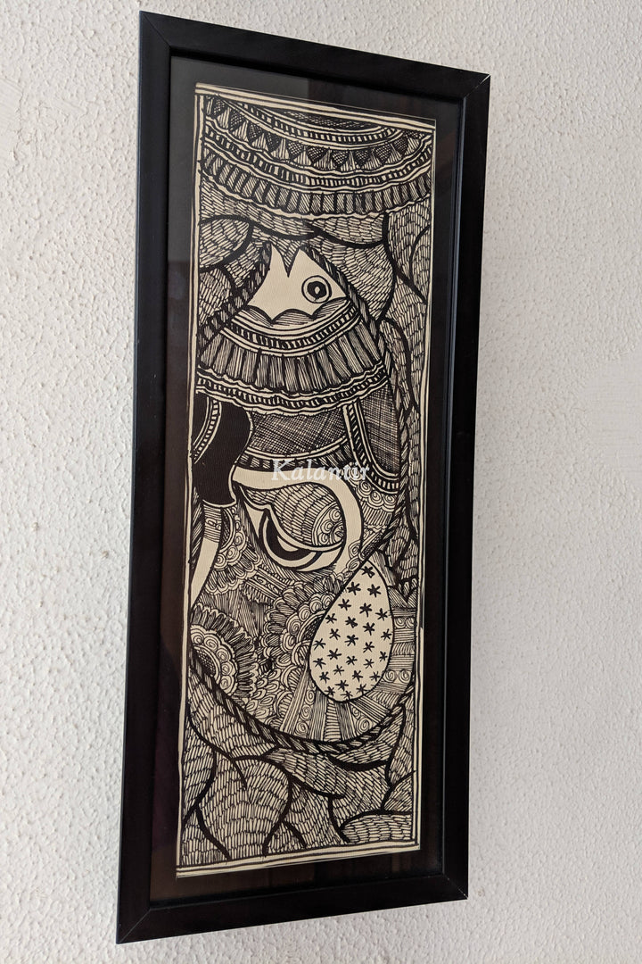 Side view of the Framed Madhubani Painting of Ganesha, hanging on a wall.