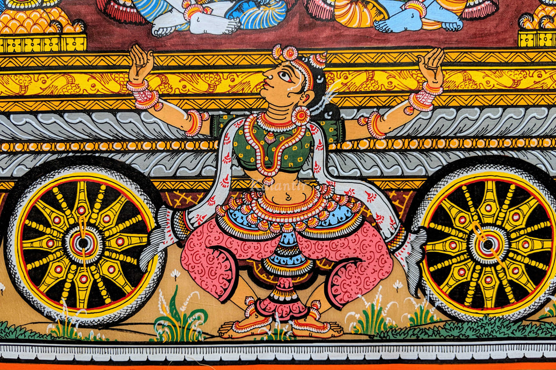 Gopika deeply saddened by Krishna leaving for Mathura, trying to stop the chariot wheels from moving in this Pattachitra Painting