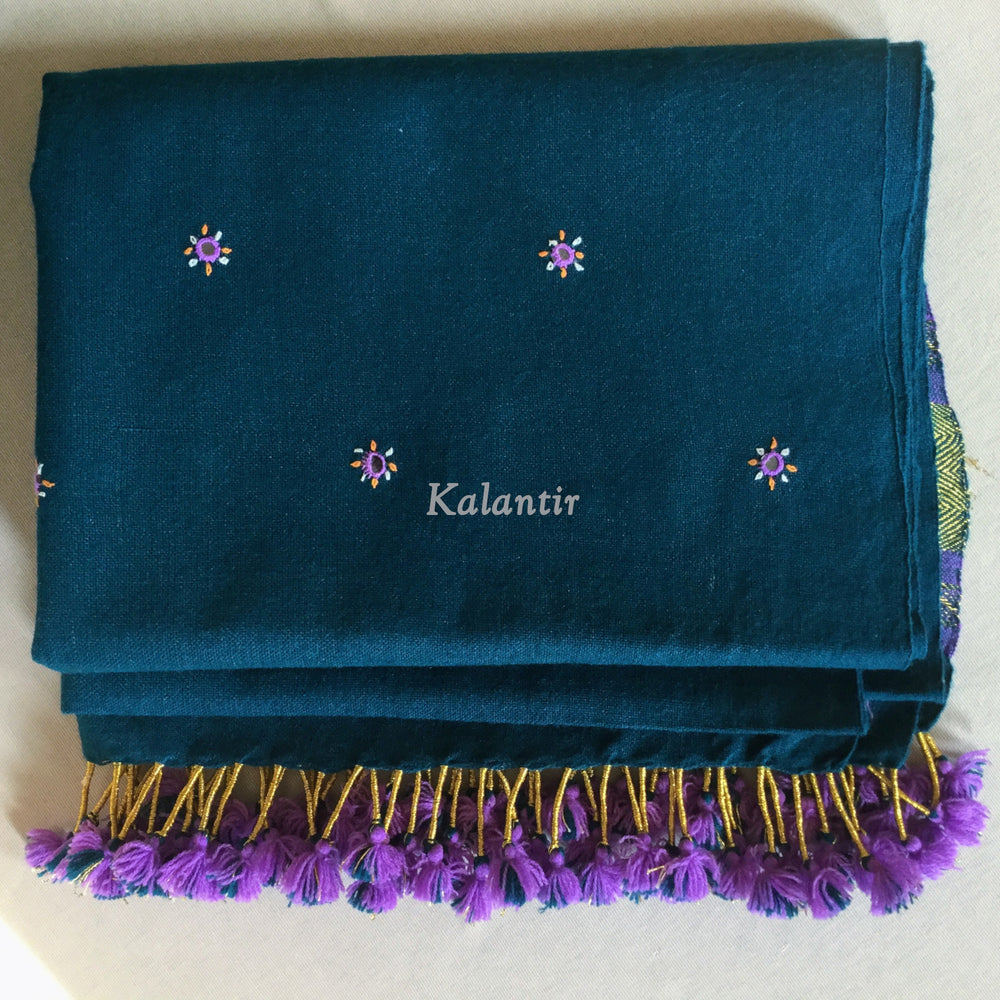 Hand-embroidered flowers on Prussian Blue Stole, kept folded.